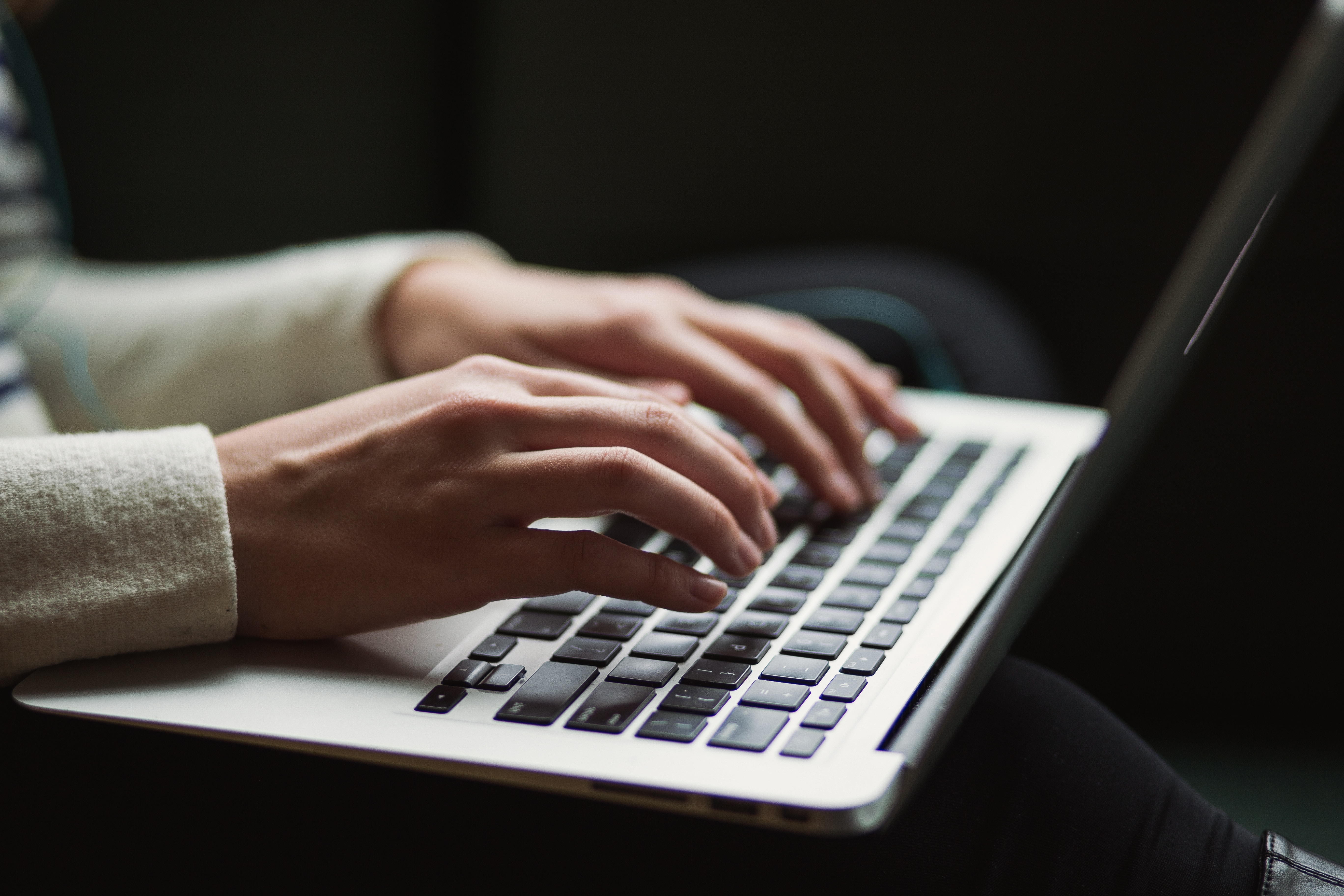 someone typing on a computer's keyboard